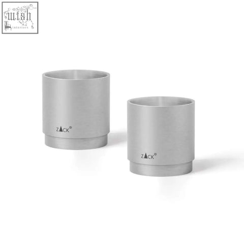 Two sleek matte silver stainless steel egg cups from the zack salo premium set with minimalist design and logo