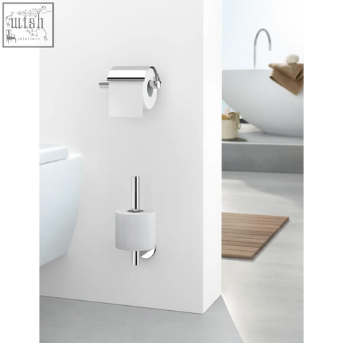 Zack Scala polished stainless steel toilet roll holder with chrome finish and modern design mounted on white wall