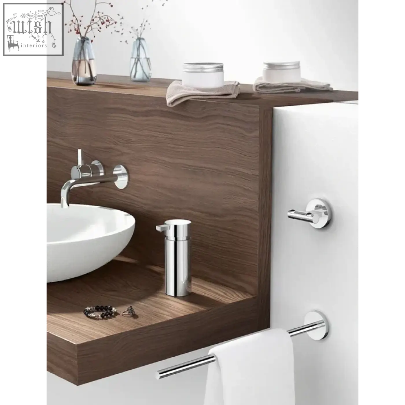 Chrome finished scala soap dispenser with sleek cylindrical design in polished stainless steel for modern bathrooms