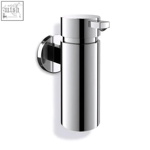 Chrome finished wall-mounted scala soap dispenser with sleek cylindrical body and rectangular push-button nozzle in stainless steel