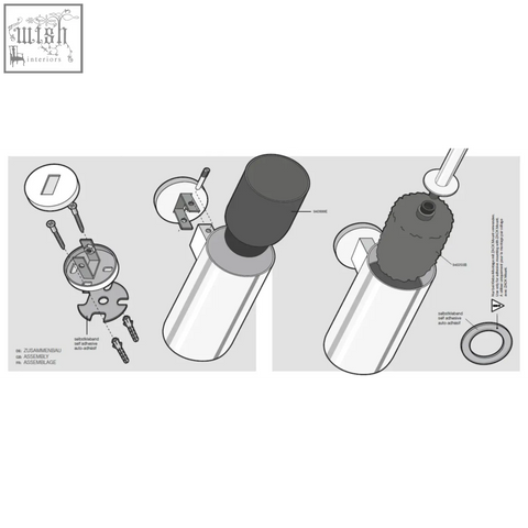 Metallic cylindrical soap dispenser with dark gray textured pump and white base next to scala stainless steel toilet brush
