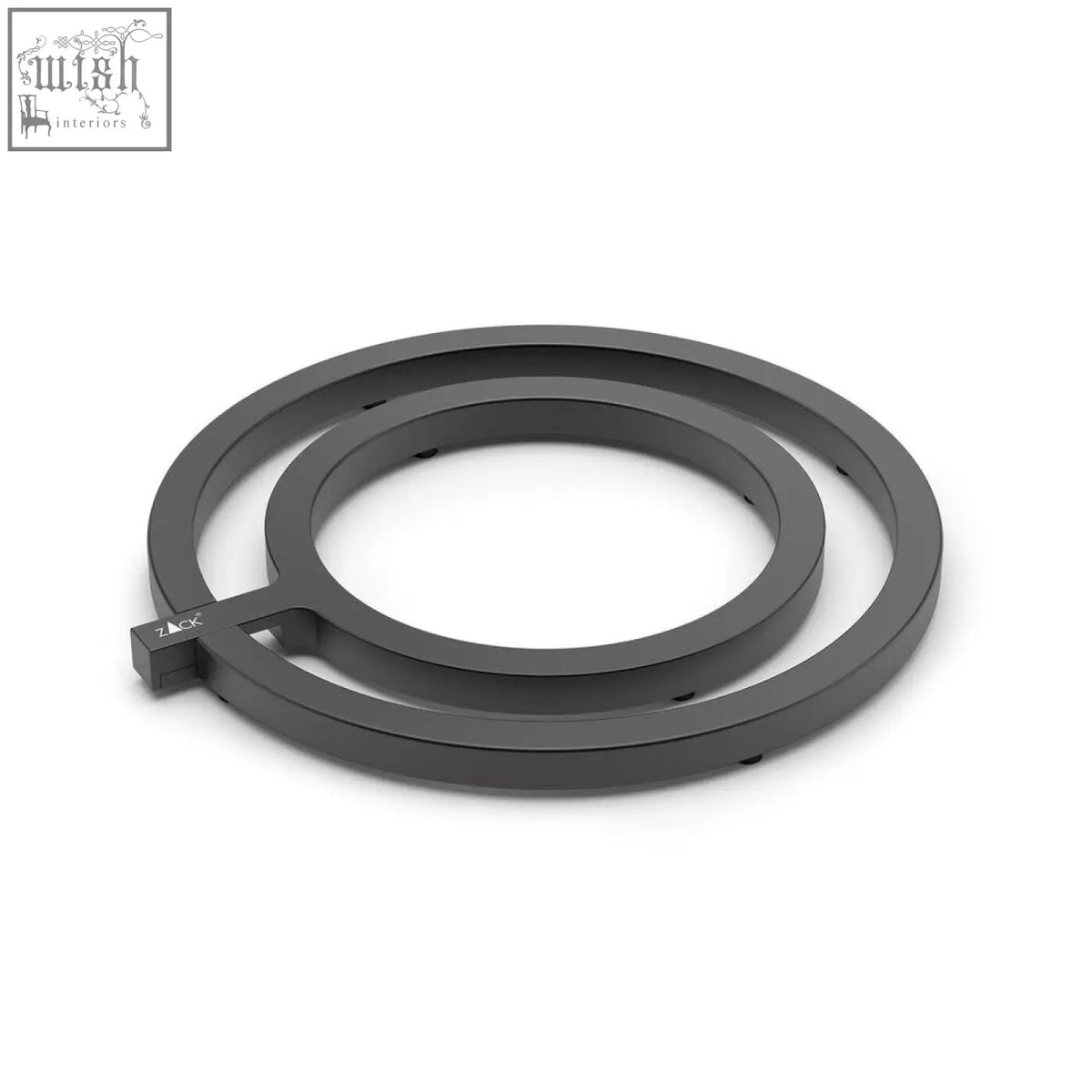 Black matte dark grey vargo table trivet with minimalist interlocking design and small branded tag for heat protection