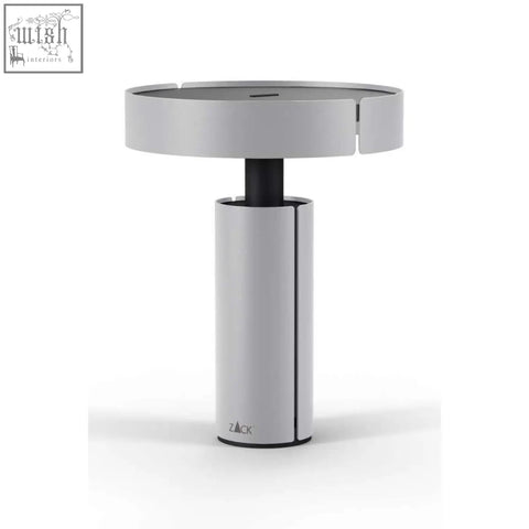 Silver rechargeable stainless steel led table lamp with sleek modern design and black central column by Zack Yaro