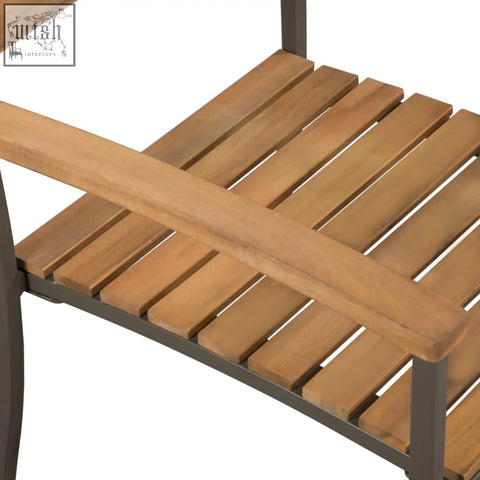 Teak wood slatted bench with dark metal frame made from solid acacia wood perfect for garden dining setup