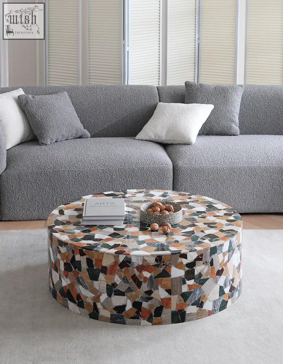 Circular zahra modern coffee table with multicolored marble mosaic design in earthy tones perfect for living rooms