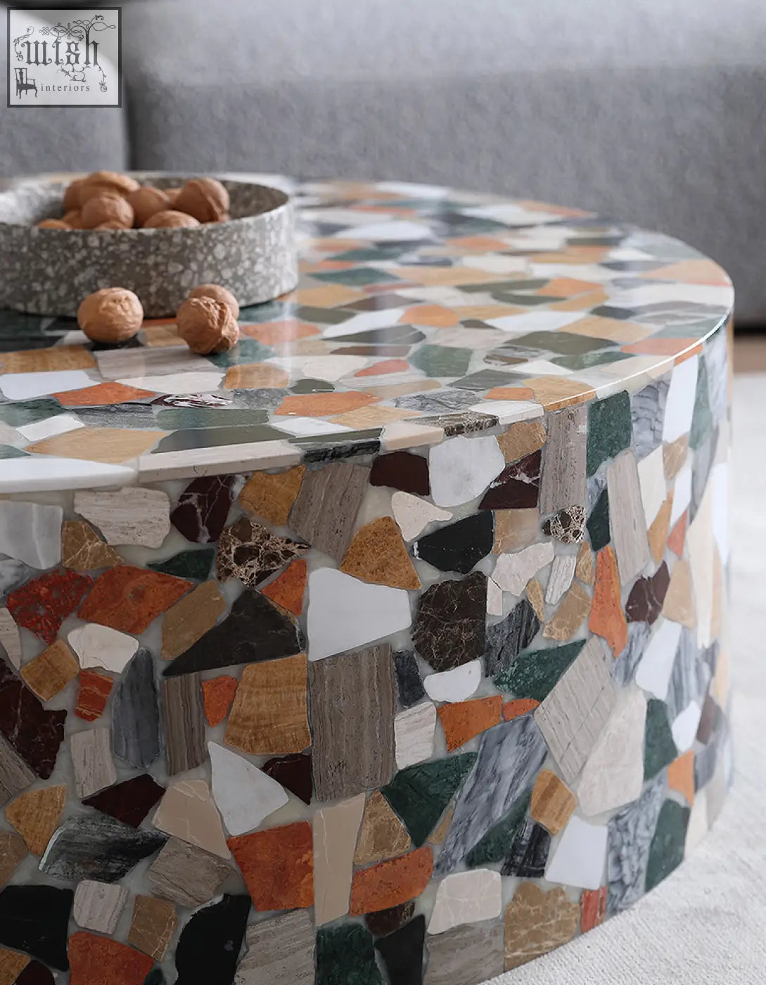 Round coffee table with colorful mosaic marble surface in earthy tones from zahra modern coffee collection with low shipping cost