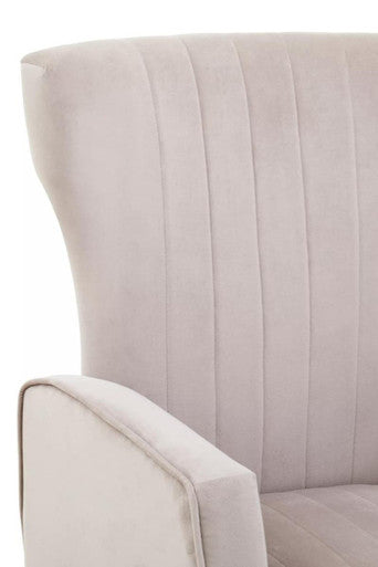 Beige mink velvet accent chair with vertical pleats curved armrest and gold finish legs for stylish seating