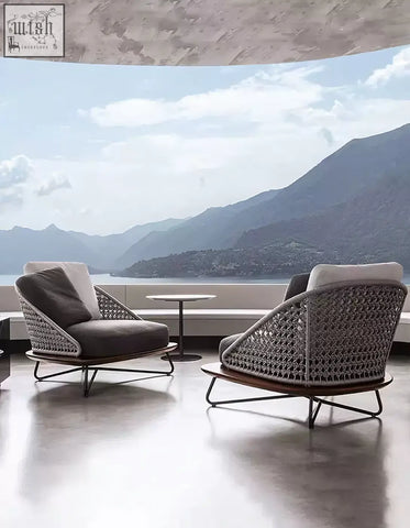 Modern gray woven lounge chairs with sleek metal frames and plush cushions in zarina outdoor sofa set