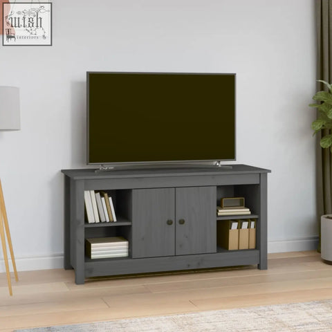 Gray wooden tv stand with two cabinet doors and open shelving made from solid wood featuring straight grain patterns zavren pinewood 103cm