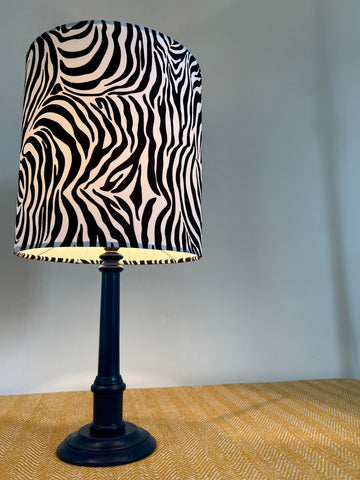 Zebra cotton drum ceiling shade with black and white zebra print, navy blue base, 30cm height, fitting sits 3-4cm