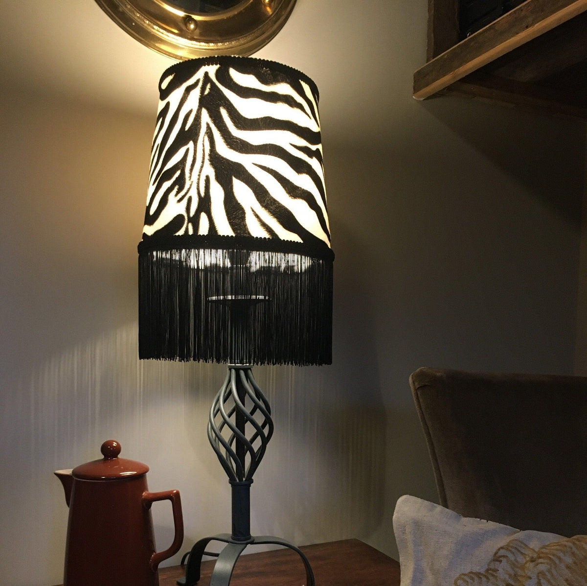 Black and white zebra print velboa french drum lampshade with black fringe trim and braid detail