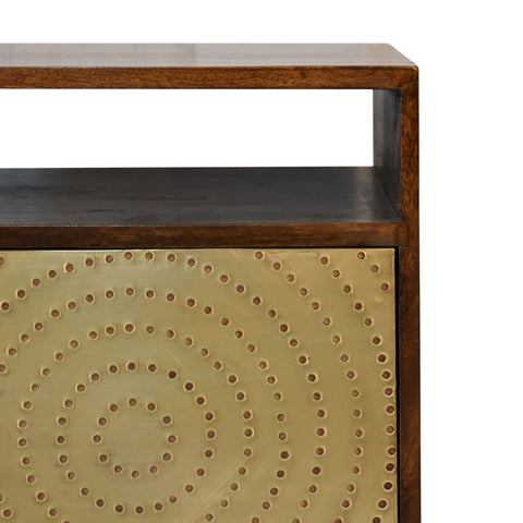 Bronze metal panel with circular hole patterns framed by dark wood on zen bedside table chestnut solid mango wood