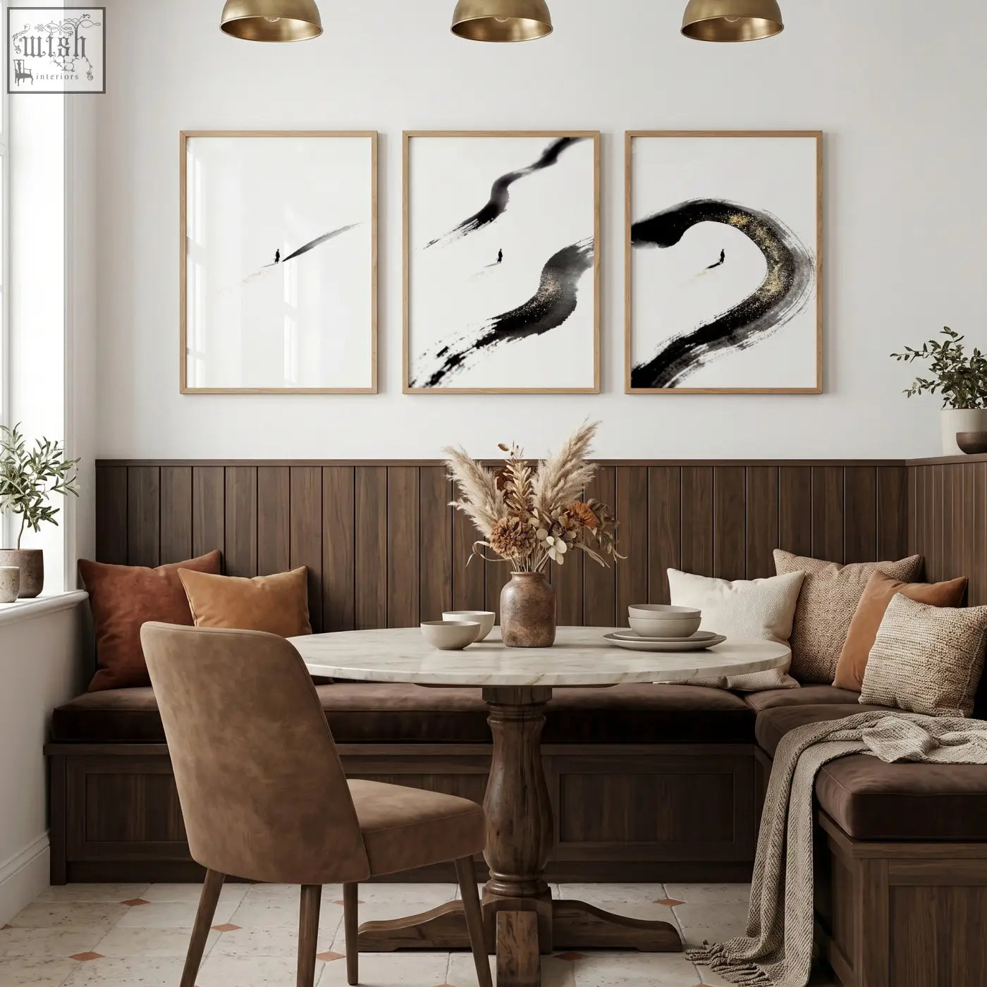 Three black-framed zen wall decor prints with bold ink brushstroke and lone figure designs above a dining room table