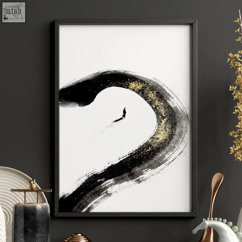 Black-framed minimalist zen wall decor featuring a bold black and gold brushstroke with a lone figure walking through its curve for dining room