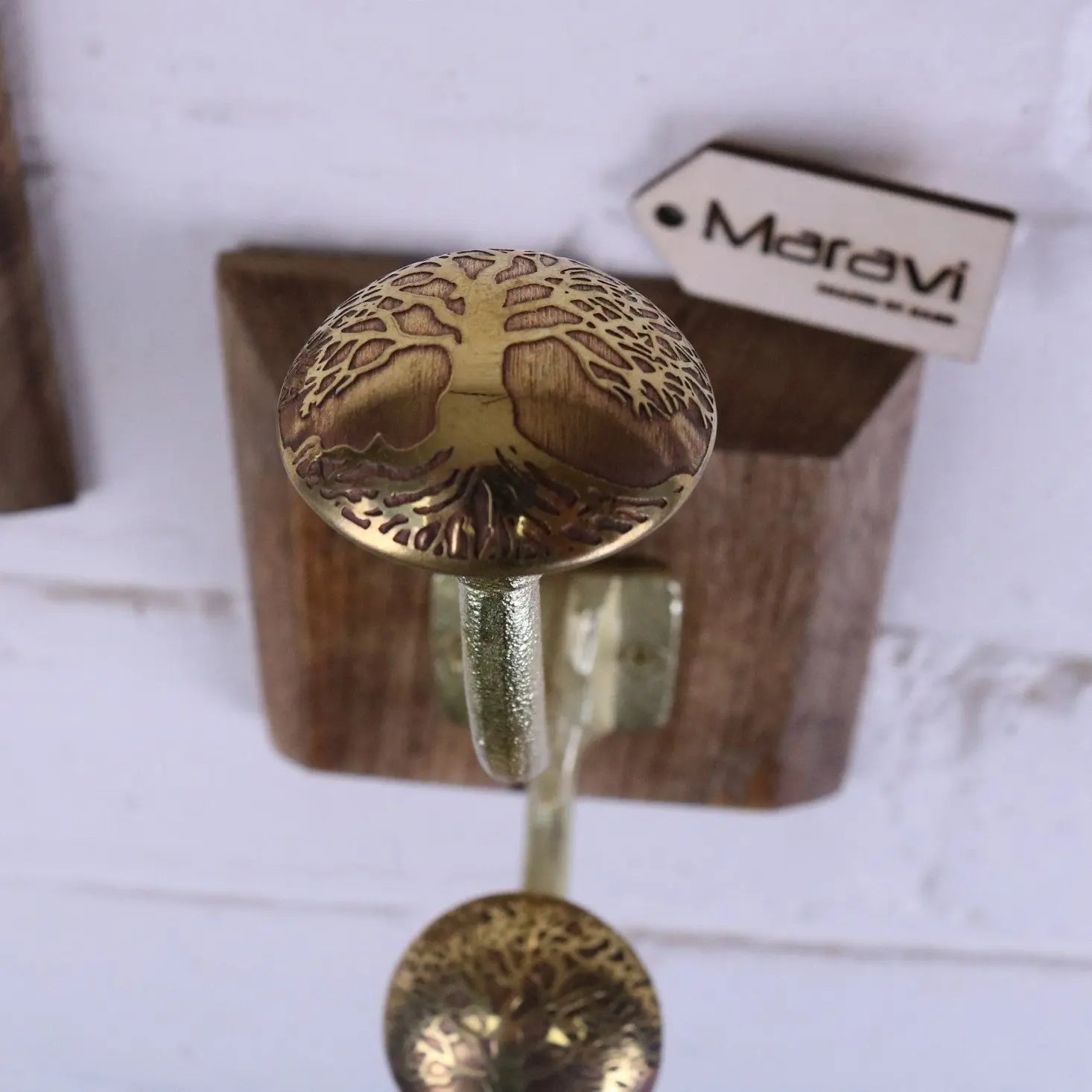 Zerika antique gold coat hooks set of 2 with brass tree of life design and matching circular base for gold coat storage