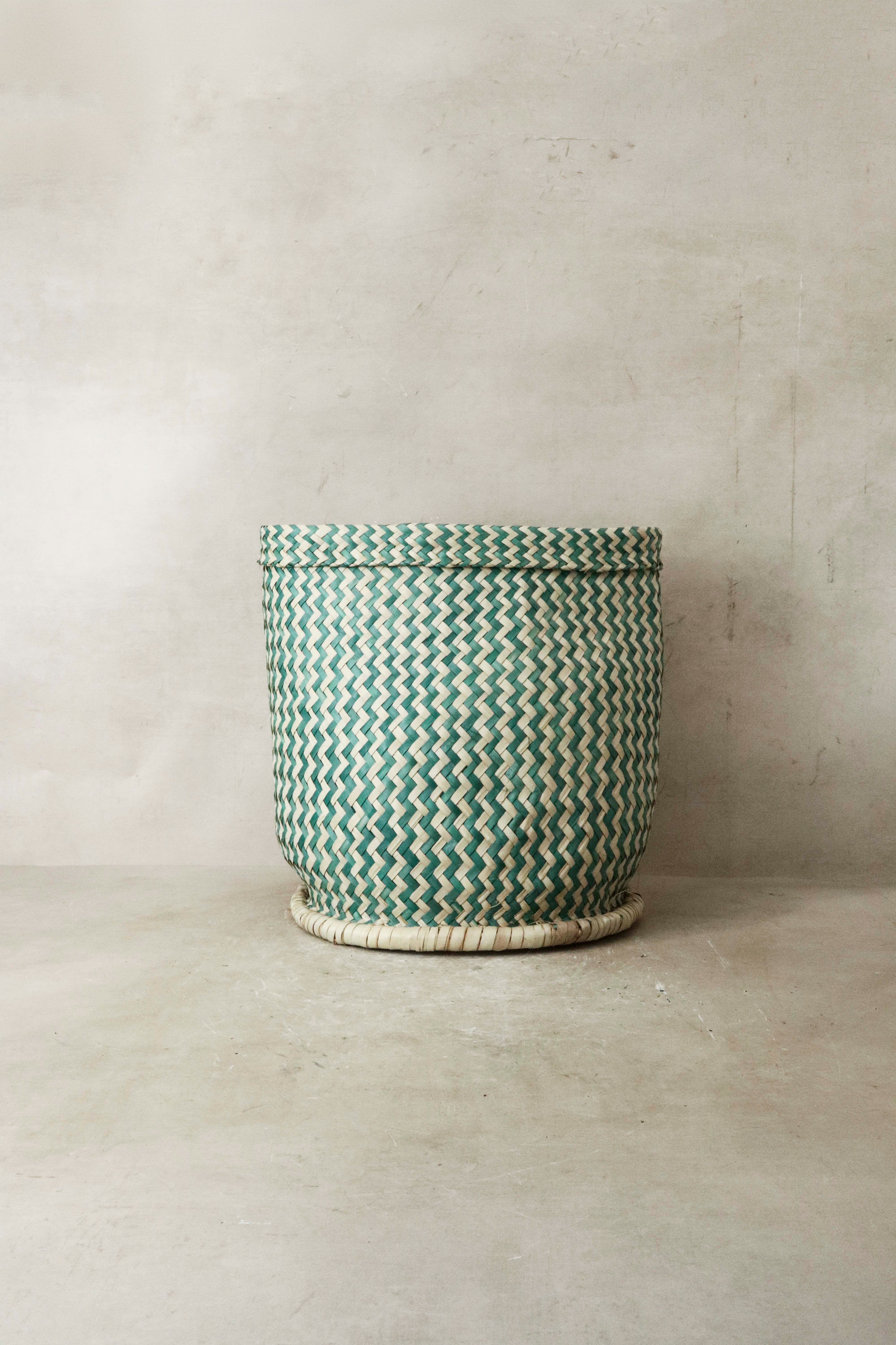 Green and white zig zag woven planter basket with matching lid made in malawi perfect for indoor plants