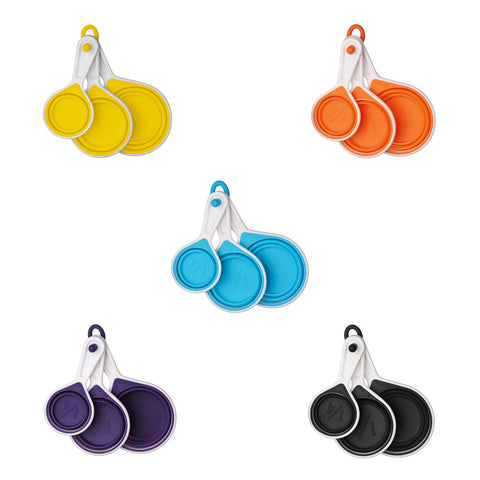 Set of four zing blue collapsible silicone measuring cups in yellow orange blue purple and black with white handles
