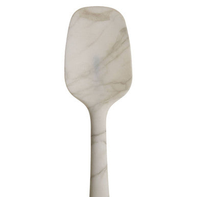 A sleek white marble-effect silicone spoon with a flexible handle perfect for cooking and baking tasks