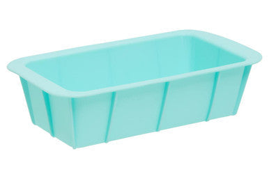 Light blue silicone loaf mould with vertical ridges in a pastel green loaf mould design for easy baking use