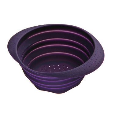 Zing purple collapsible colander made of flexible silicone with ribbed design and perforated base for easy straining