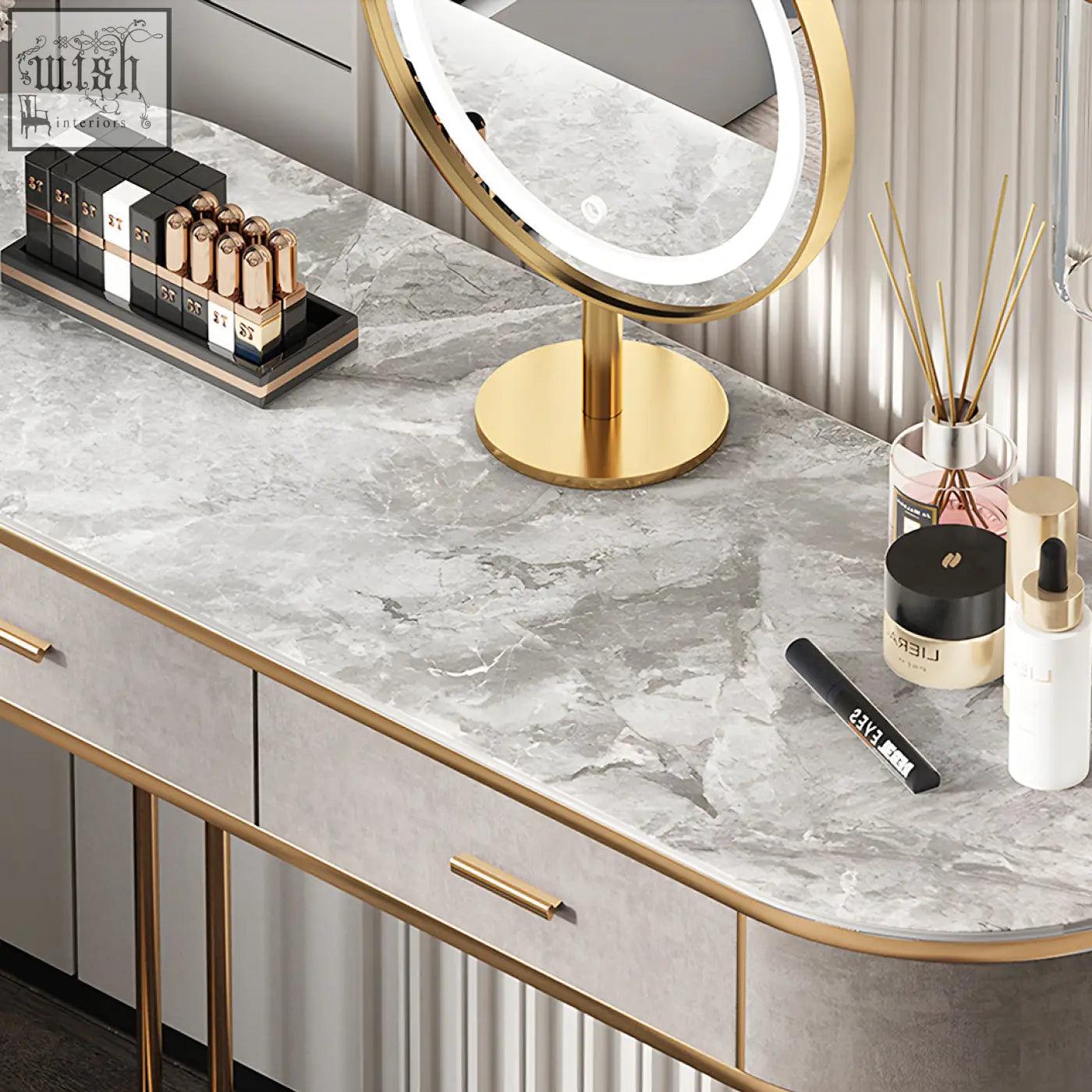 Gold-framed round vanity mirror with illuminated edge on grey marble zoey dressing table with led mirror
