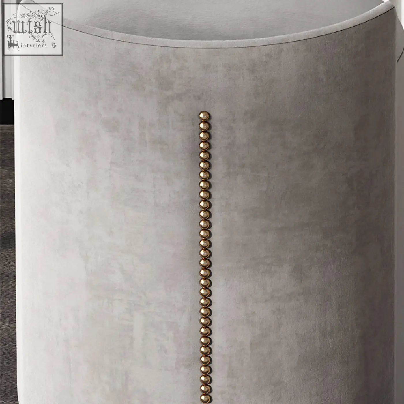 A sleek grey velvet side table with gold nailhead trim from the zoey dressing table with led mirror set