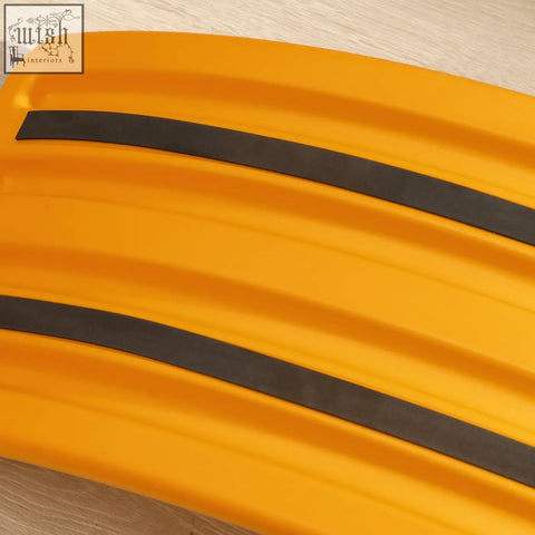 Bright orange zonekiz balance board with two black rubber strips as a stepping stone for kids ages 3 to 6 years