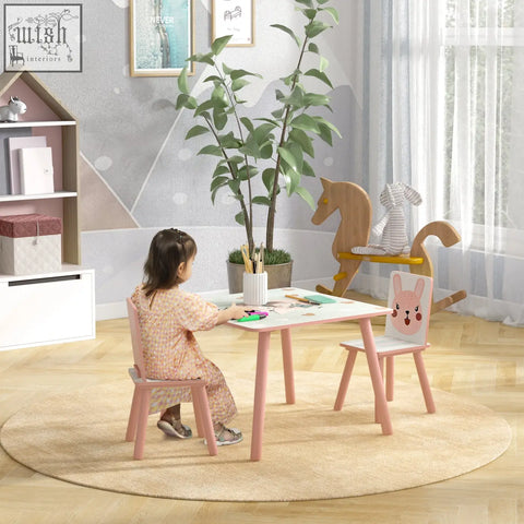 Pink wooden children desk with white surface and playful bunny on two matching chairs three-piece set for ages 3-6