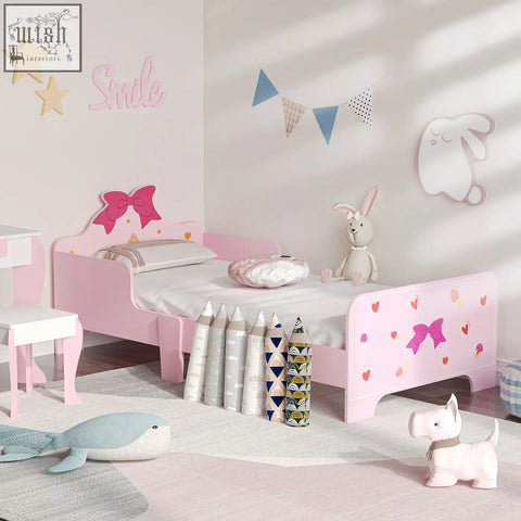 Pink zonekiz princess toddler bed made of multilayer board with bow and heart decals and safety rails for kids 3-6 years