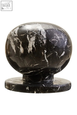 Zoro black and white veined marble ball sculpture with a rounded bulbous top on flat circular base