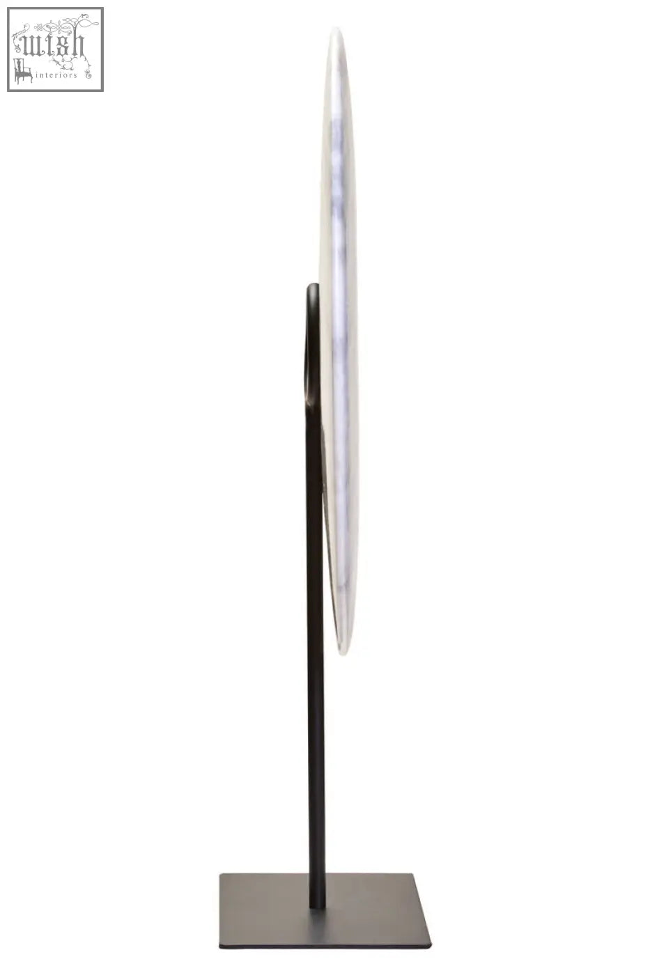 A zoro extra large round mirror with a thin metallic frame and dark bronze stand paired with a white marble disc sculpture