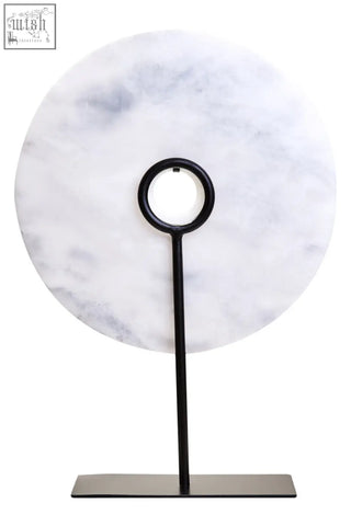 White marble disc sculpture on a zoro large round 30cm marble disc with black metal stand tray display