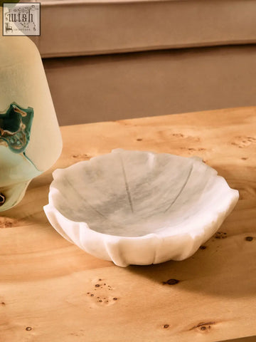 A zoro large white marble lotus bowl with a leaf scalloped edge and subtle gray veining in large white marble