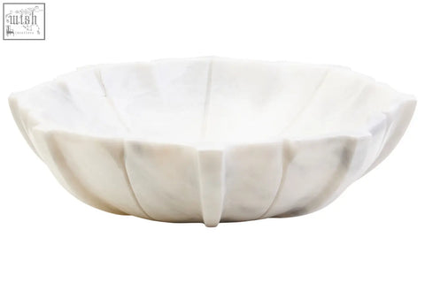 A zoro large white marble bowl with a petal-like fluted design in elegant large white marble material