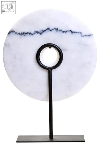 Zoro medium round white marble disc sculpture with black veining on a sleek black metal stand round dia 25cm