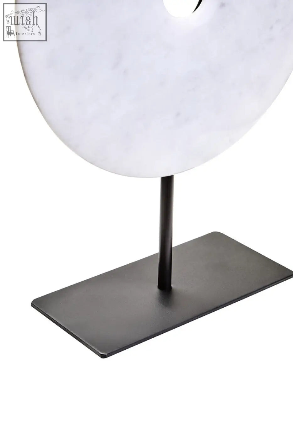 Zoro medium round white marble disc sculpture with central hole on black metal stand medium round dia 25cm