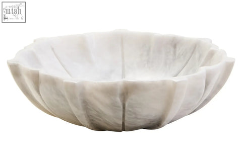 A white marble lotus bowl with a petal-like fluted design perfect as a decorative marble lotus centerpiece