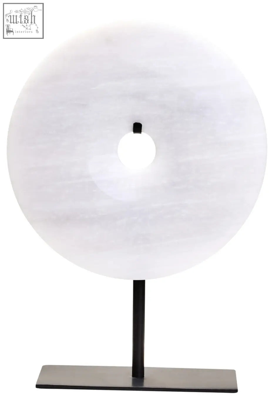 A sleek zoro small round table lamp with a white marble disc and minimalist black metal stand round dia 20cm