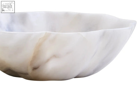 Zoro small white marble scalloped bowl with subtle beige and gray veining and a smooth irregular rim