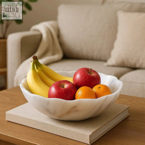 A zoro small white marble scalloped bowl holding bananas apples and oranges for fruit display